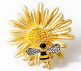 gold tone Bee Brooch with a little bee visiting the Daisy flower